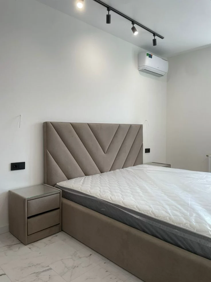 Modern V-Shaped Chevron Tufted Fully Upholstered Bed Frame